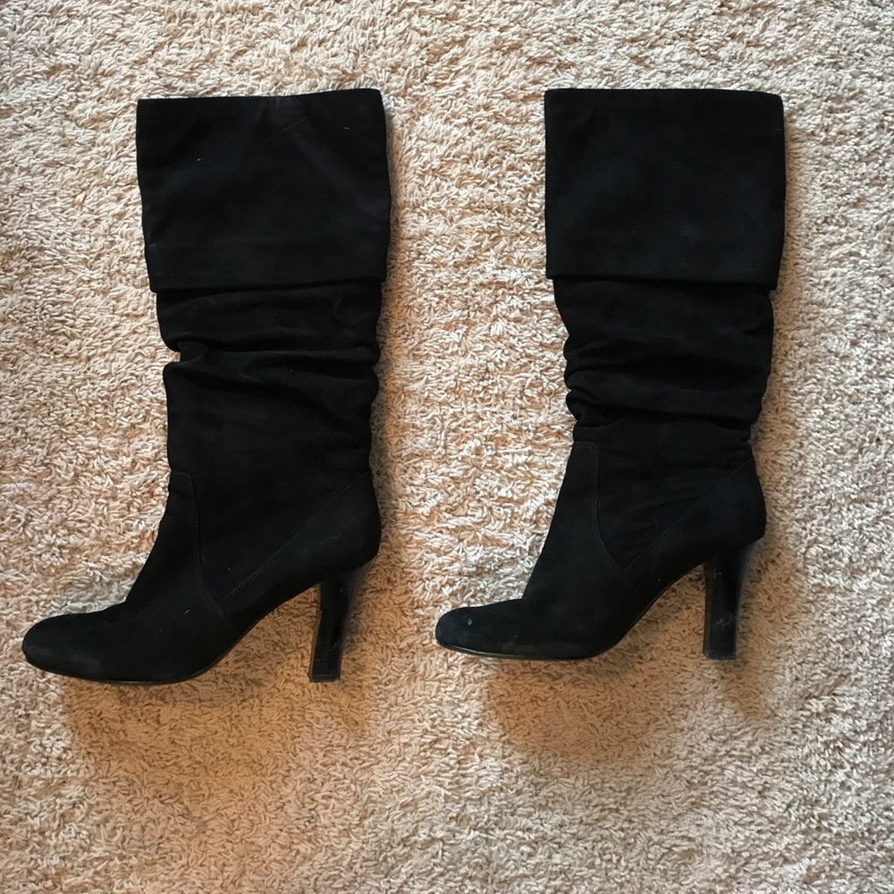 Black knee high heeled boots